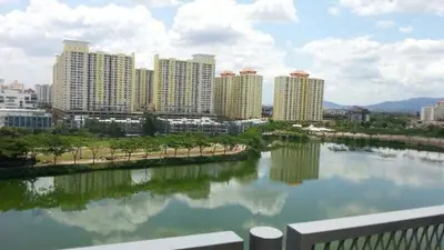a view of a city with tall buildings and a river at Setapak Central KL - Zetapark Spring Suites in Kuala Lumpur