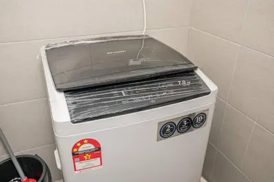 a small refrigerator with a glass top on top of it at EkoCheras max5pax Romance Retreats #freeparking #netflix #wifi in Kuala Lumpur