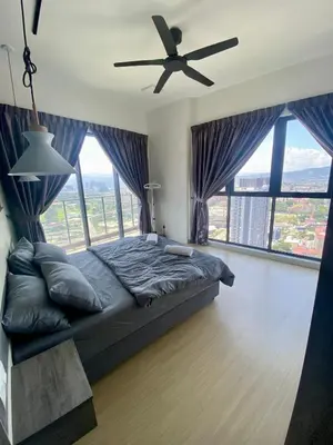 a bedroom with a bed and a ceiling fan at TOP FLOOR 3BR apartment in KL for 6Pax in Kuala Lumpur