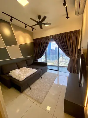 a living room with a bed and a large window at TOP FLOOR 3BR apartment in KL for 6Pax in Kuala Lumpur