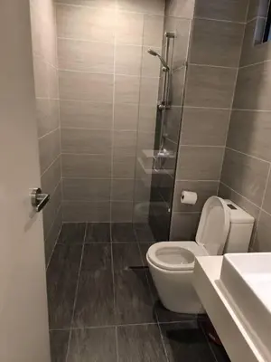a bathroom with a toilet and a shower at Trion By Awesome Apartment Stay in Kuala Lumpur