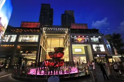 a shopping center with a flower display in front of it at Bintang Fairlane Residence, KLCC & City View - 2B1R in Kuala Lumpur