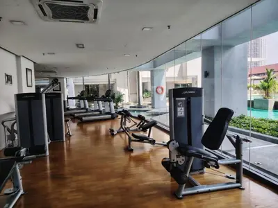 a gym with treadmills and exercise equipment in a building at Swiss Garden Bukit Bintang in Kuala Lumpur