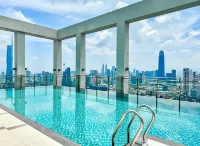 a swimming pool with a view of the city at trion2 klcc in Kuala Lumpur