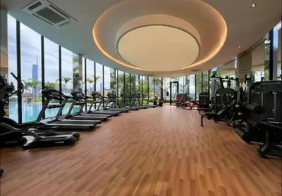 a gym with a row of treadmills and ellipticals at trion2 klcc in Kuala Lumpur