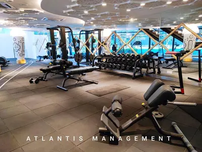 a gym with treadmills and exercise equipment in a building at Arte Mon Kiara MK3 Royal Stylist Apartment, Walking Distance to Publika in Kuala Lumpur