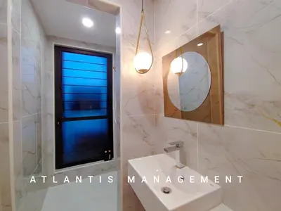 a bathroom with a sink and a mirror at Arte Mon Kiara MK3 Royal Stylist Apartment, Walking Distance to Publika in Kuala Lumpur
