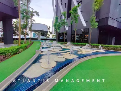 a water fountain in front of a building at Arte Mon Kiara MK3 Royal Stylist Apartment, Walking Distance to Publika in Kuala Lumpur