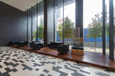 a waiting room with chairs and large windows at 1-6pax Dorsett KL 3mins to Pavilion Infinity Pool in Kuala Lumpur