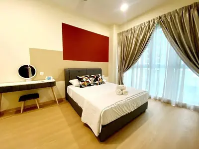 a bedroom with a bed and a large window at 2br 2ba in the heart of KL, Regalia Residence in Kuala Lumpur