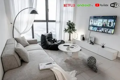 a living room with a couch and a table at Trion KL -2BR, 2-5pax, near KLCC, KL Tower, IKEA, Velocity in Kuala Lumpur