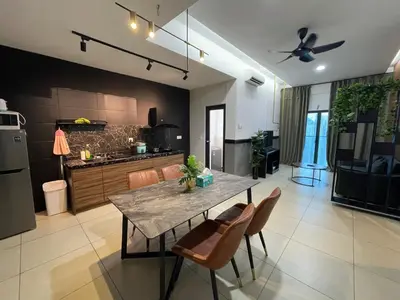 a kitchen and dining room with a table and chairs at Reizz Residence Zen Den in Kuala Lumpur