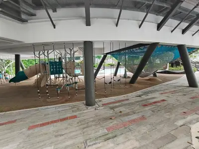 a group of swings in a playground at M Centura Sentul Condominium Two Bedroom in Kuala Lumpur