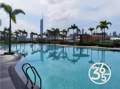a swimming pool with a city skyline in the background at 4Pax Trion Superior 1 Bedroom \u4e2d\u6587\u623f\u4e1c in Kuala Lumpur