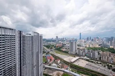 a view of a city with buildings and a highway at Bea Bea's Kidz Dreamland Mini Horse 4br 11pax MRT in Kuala Lumpur
