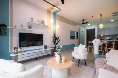 a living room with a couch and a tv and a table at Bea Bea's Kidz Dreamland Mini Horse 4br 11pax MRT in Kuala Lumpur