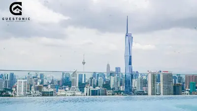 a view of the city from the observation deck of a skyscraper at Riveria City KL Sentral by Guestonic in Kuala Lumpur