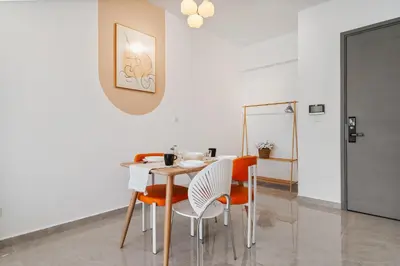 a dining room with a table and chairs at Agile Bukit Bintang in Kuala Lumpur