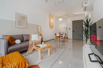 a living room with a couch and a table at Agile Bukit Bintang in Kuala Lumpur