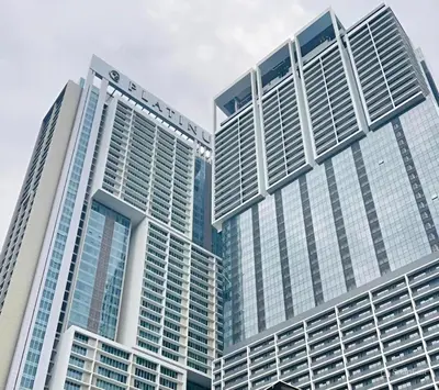 two tall buildings in a city at Platinum 2 KLCC By Natol Chain Of Homestays in Kuala Lumpur