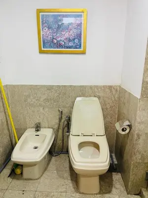 a bathroom with a toilet and a sink at Jalan imbi Suites At Times Square KL in Kuala Lumpur