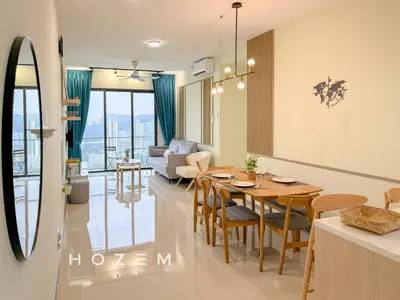a dining room and living room with a table and chairs at 3BR3B Hozem KL4523 Apartment Segambut in Kuala Lumpur