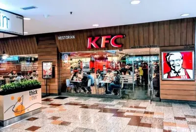 a kfc restaurant in a shopping mall at Times Square Suite KL in Kuala Lumpur