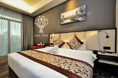 a bedroom with a large bed in a room at Menara M101 Dang Wangi Kuala Lumpur in Kuala Lumpur