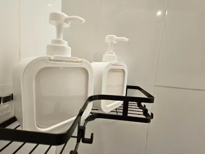 a bathroom with two urinals on a wall at Scenic Garden Balcony EST Bangsar Studio for 2 in Kuala Lumpur