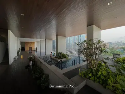 a lobby of a building with plants in it at Scenic Garden Balcony EST Bangsar Studio for 2 in Kuala Lumpur