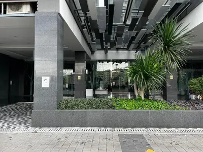 a lobby of a building with plants in it at Seasons Gardens Wangsa Maju, KL - 3 bedroom apartment in Kuala Lumpur