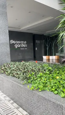 a hedge of plants in front of a building at Seasons Gardens Wangsa Maju, KL - 3 bedroom apartment in Kuala Lumpur