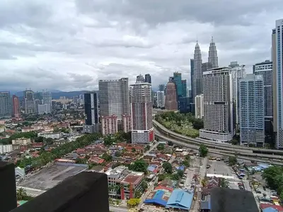 an aerial view of a city with tall buildings at COL 18A Modern Balcony KLCC View Infinity Pool in Kuala Lumpur