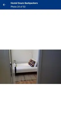 a view of a room with a bench in the doorway at Travel INN Bukitbintang in Kuala Lumpur