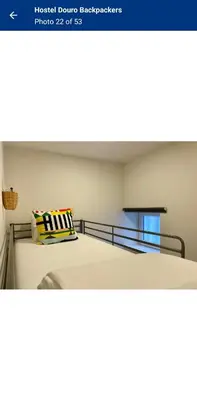 a bedroom with a bed with a pillow on it at Travel INN Bukitbintang in Kuala Lumpur