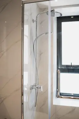 a shower with a glass door in a bathroom at Agile BB Residence Pavilion TRX by GB in Kuala Lumpur