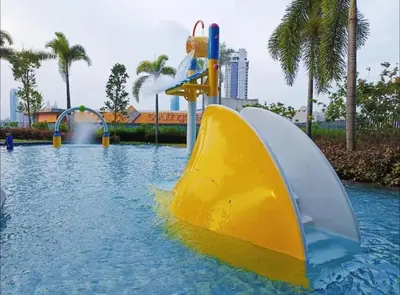 a water park with a slide in the water at Trion KL - 2 Bedroom, 5 pax, Netflix, Free Car Park in Kuala Lumpur