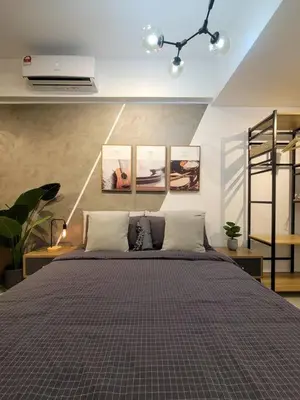 a bedroom with a large bed in a room at COL 14A Modern Infinity Pool KLCC View with Balcony in Kuala Lumpur