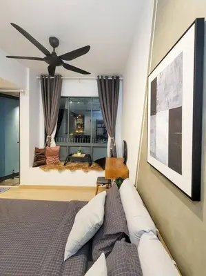 a bedroom with a bed and a ceiling fan at COL 14B Modern Infinity Pool KLCC Balcony View in Kuala Lumpur