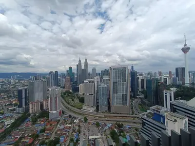 an aerial view of a large city with buildings at LUX 39A Balcony KLCC View 1 Bedroom Infinity Pool in Kuala Lumpur