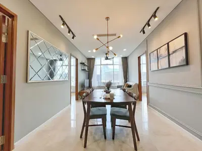 a dining room with a table and chairs at Sky Suites Leisure 3BR Suite at KLCC in Kuala Lumpur