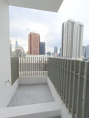 a balcony with a view of a city skyline at COL 915B Studio Balcony Infinity Pool KLCC View in Kuala Lumpur
