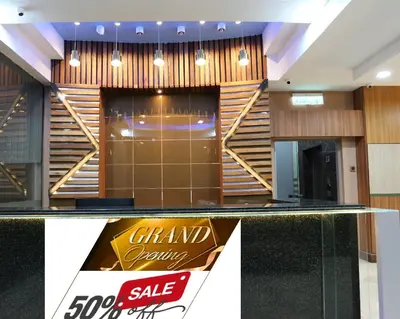 a room with a counter with a sale sign on it at Hotel La ISRA at Bukit Bintang in Kuala Lumpur