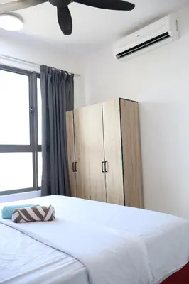 a bedroom with a white bed with a ceiling fan at Cozy kenwingston Platz KL 2-5 pax 2BR&2BR genting view parkin netflix 3802 in Kuala Lumpur