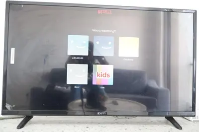 a display window of a tv with a couch at Cozy kenwingston Platz KL 2-5 pax 2BR&2BR genting view parkin netflix 3802 in Kuala Lumpur
