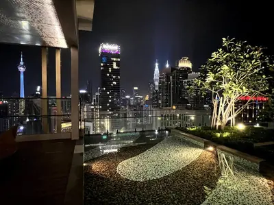 a view of a city at night from a building at KL Suites Axon Residence - Wi-Fi 500Mbph in Kuala Lumpur
