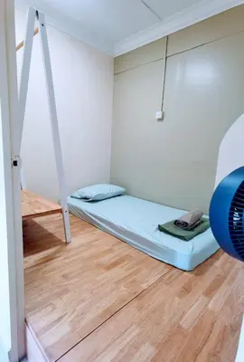 a room with two bunk beds and a wooden floor at Tatami MUJI Relax 5p City center Staycation MRT in Kuala Lumpur