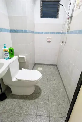 a bathroom with a toilet and a shower at Tatami MUJI Relax 5p City center Staycation MRT in Kuala Lumpur