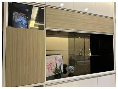 a cabinet with a window with a flower on it at Setapak Central Premium Suites in Kuala Lumpur