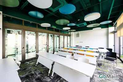 an office with white tables and chairs and blue lights at 24h Check in & SkyPool- KL Sentral Suite Riveria City Near KL Sentral KL KLCC in Kuala Lumpur